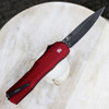 The Kershaw Livewire Napa Merlo being deployed highlighting the snappy double-action and 8.1-inch overall length.