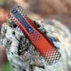 Microtech Hera II Mini 1702M-10RX51S closed 3.95 in — orange X-51 aluminum, M390MK OTF, 1.90 oz, tip-down right carry, made in USA