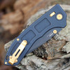 Close-up AXIS Lock and gold mini deep-carry clip on Benchmade Narrows SPL1