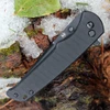 Textured black G10 handle with button lock mechanism