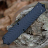 CRKT Xolotl OTF Auto 5335 profile view showing 3.50 inch MagnaCut black double-edge dagger blade and sculpted black aluminum handle.