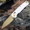 Kershaw Bel Air Pope White 6105WGLD folding knife open showing the 3.13-inch gold MagnaCut blade and white handle.