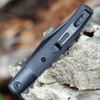 Boker Plus Modern Stockman 01BP0034 tip-up pocket clip — black Micarta closed, black bolsters, ball-bearing flipper tab visible