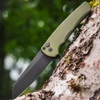Pro-Tech Malibu 5403 green in hand, 7.5 inch overall, 3.2 oz, made in USA manual button lock flipper
