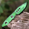 Heretic Kobold Toxic Green Cel Shade under UV black light — UV reactive finish glowing, H065-CS-TX
