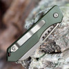 Heretic Jinn Auto H113-7A-GRN, OD Green aluminum chassis, bronze CPM-MagnaCut Wharncliffe blade open