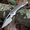 Microtech Mini Stitch RAM-LOK 169MRL-10MS1 open — Bohler M390MK stonewash spear point blade, stonewash slab side titanium handle, bronze titanium accents