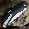 Gerber Forefront Hunt 2009292 spine view — "Made in USA 420HC" blade stamp, black glass-filled nylon handle, Gerber clip, thumb stud visible