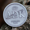 Boker Germany 2026 ADK BRLW 110673 collector package — ADK Annual Dealer Knife coin, felt sheath, red Richlite limited edition