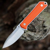Boker Germany Kiboku 120573 — RWL-34 two-tone drop point blade, orange G10 handle, full-tang fixed blade, Lucas Burnley design, Solingen
