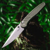Pro-Tech Avalon Peace Neighbor PN1101-GREEN — open, 4.25" CPM-MagnaCut stonewash drop point blade extended, shown outdoors