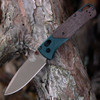 Benchmade Seasonal Bugout 535FE-2602 open — CPM-S90V FDE Battlewash drop point, Taiga Green aluminum, brown canvas Micarta, AXIS Lock