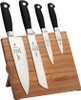 Mercer Genesis 5-Piece Bamboo Set (MCR21960BM) shown against a white background. The set includes an 8.00" chef's knife, 8.00" wavy edge bread knife, 5.00" utility knife, and 3.50" paring knife — each with forged X50CrMoV15 satin blades with short bolsters and ergonomic black Santoprene handles. The sustainable bamboo magnetic board with recessed magnetic bars and anti-skid base pad is shown alongside the set.