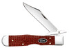 Case Cheetah Cub Vault (12277) shown in the closed position against a white background. The handle is smooth dark red burlap Micarta with visible fiber texture and a black oval script Case shield inlay at the center. High-polished nickel silver bolsters are visible at both ends. The nail nick on the mirror polished 1095 carbon steel clip point blade is visible at the pivot. The swing guard is visible at the bolster. The lockback spine is visible on the handle.