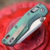 Microtech MSI Mini Ram-Lok Marfione Select closed, back view showing bronze titanium hardware and Ram-Lok lock bar