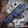 Heretic Jinn Manual H213-TOPO black topo aluminum handle — fully deep-engraved topographical pattern, Button Lock, 2.25 oz, 3.75 in closed