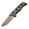 A Benchmade Mini Adamas folding knife shown with the blade deployed, highlighting the MagnaCut Flat Dark Earth Cerakote drop-point blade alongside the contoured OD Green G10 handle and AXIS Lock mechanism.