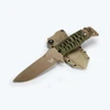 A Benchmade Fixed Adamas fixed blade knife shown alongside its Ranger Green PIM sheath and MALICE CLIPS, highlighting the MagnaCut Flat Dark Earth Cerakote drop-point blade and skeletonized handle wrapped with OD Green paracord.