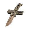 The Benchmade Adamas® (275FE-04) shown with its 3.82-inch CPM MagnaCut drop-point blade finished in Flat Dark Earth Cerakote®, OD Green G10 handle scales over full-length stainless steel liners, and its tip-up deep carry black oxide pocket clip. The AXIS Lock bar is visible along the spine, with the Tan Ballistic Nylon sheath and Malice Clip® shown alongside the knife.