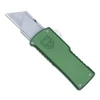 The CobraTec OTF Utility Knife (CTOTFUTODG) shown with its dual action OTF mechanism, standard replaceable utility blade, OD Green anodized 6061-T6 aluminum handle, and its right-hand carry pocket clip. The spring-loaded blade lock arrow used for blade changes is visible on the carrier. ⚠️ This is an OTF automatic knife — verify legal status in your jurisdiction before purchasing.