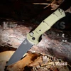 The Benchmade Claymore push-button automatic knife open, showing its 3.6-inch Cerakote-finished 154CM drop-point blade, textured Ranger Green Grivory handle, push button with integrated safety, and black oxide deep-carry pocket clip.