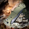 Benchmade Claymore Auto Ranger Green 9070SBK-03 with 3.60" CPM-D2 black Cerakote partially serrated blade and Ranger Green Grivory handle, open view