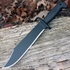 The Cold Steel Black Bear Bowie (CS-97SMBWZ) shown with its 12-inch 65Mn clip point blade in a black powder coated matte-black finish, fine-textured polypropylene handle over-molded around the full tang and solid steel guard, and its included Cor-Ex™ sheath.