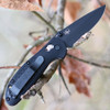 CPM-S30V stainless steel Black Combo Drop Point partially serrated edge