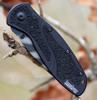 Kershaw Blur 1670TTSST assisted opening knife showing the Tiger Stripe partially serrated tanto blade and black Trac-Tec handle.