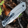 Kershaw Collateral 5500 assisted opening knife showing the satin D2 spear point blade and TiNi-coated handle with carbon fiber inlay.