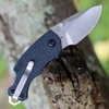 Kershaw Shuffle 8700NBSWWM open view showing the stonewashed blade, navy blue K-Texture handle, and integrated bottle opener.