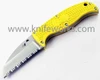 The Spyderco Enuff Salt CFB31SY is shown with its fully serrated sheepsfoot blade extending from a bright yellow textured FRN handle, alongside its polymer sheath.