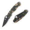The Spyderco Para Military 2 C81GPCMOBK2 is shown open against a white background. The black DLC-coated clip point blade with a Trademark Round Hole extends from a digital camo G-10 handle with a black pocket clip.