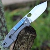 Boker Plus Vox F3 II 01BO341 profile view showing 3 inch CPM-S35VN satin clip point blade and carbon fiber handle with blue titanium hardware.