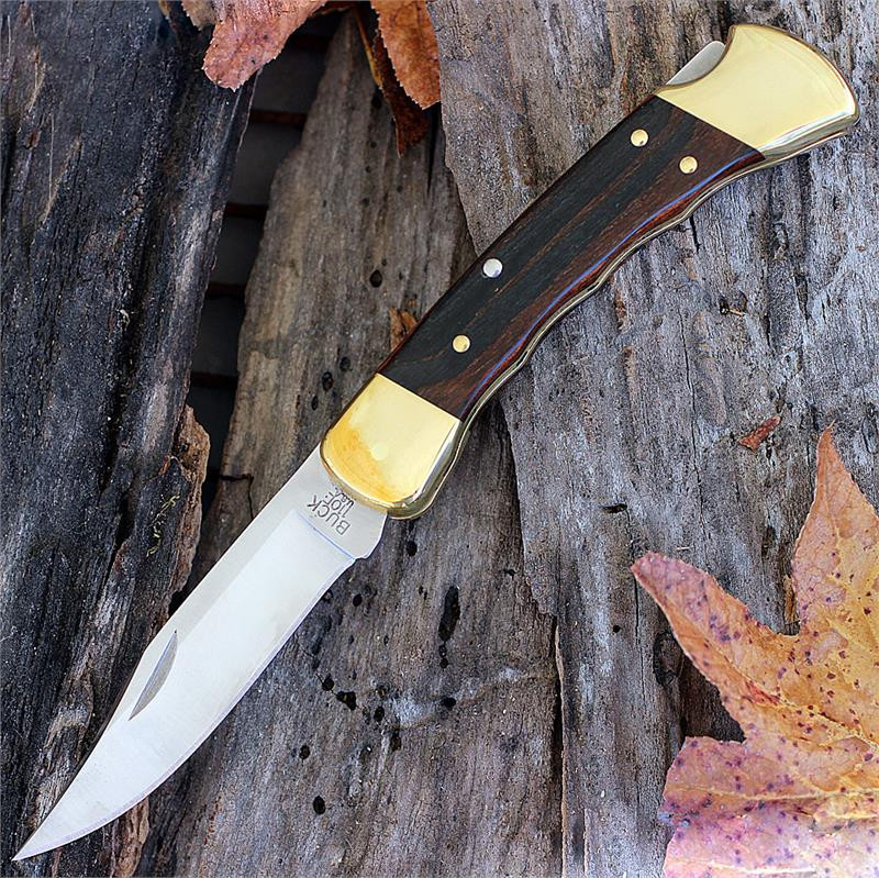 Buck 110 Folding Hunter finger grooved handle