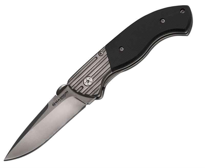 Boker Magnum Discus 02MB831 profile view showing 3.125 inch 440 matte drop point blade and black G-10 handle with satin bolsters.