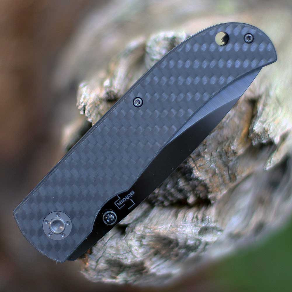 Boker Plus Anti-Grav 01BO036 close-up of the polished black carbon fiber scales and slim handle profile.
