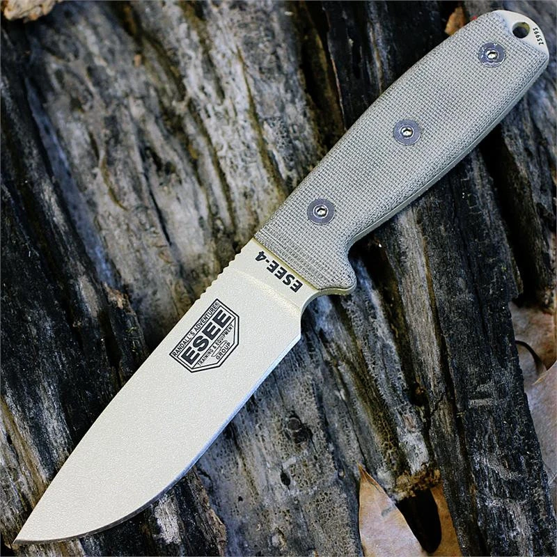 The ESEE-4 (ESEE-4P-MB-DT) shown with its 4.50-inch 1095 plain edge drop point blade in a Desert Tan finish and tall flat grind, tan Micarta handle scales, and its injection-molded OD Green polymer sheath with MOLLE back mounting.