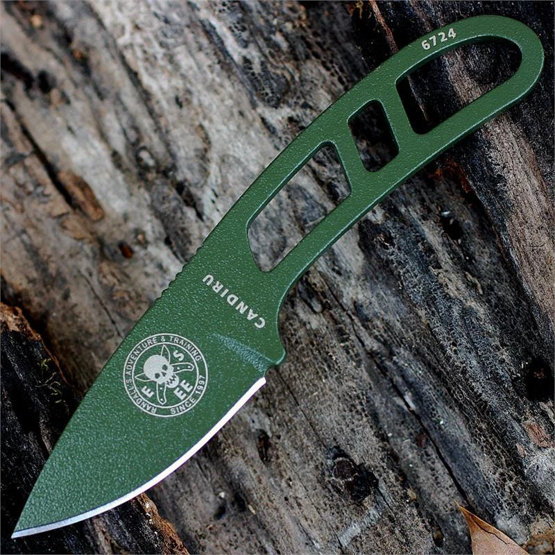 The ESEE Candiru Survival Kit (ESEE-CAN-OD-KIT) shown with its 2.00-inch 1095 plain edge drop point blade in an OD Green finish and flat grind, matching OD Green skeletonized steel handle, black polymer sheath, and the full kit: paracord, cord lock, split rings, ferro rod, whistle, and snap hook.