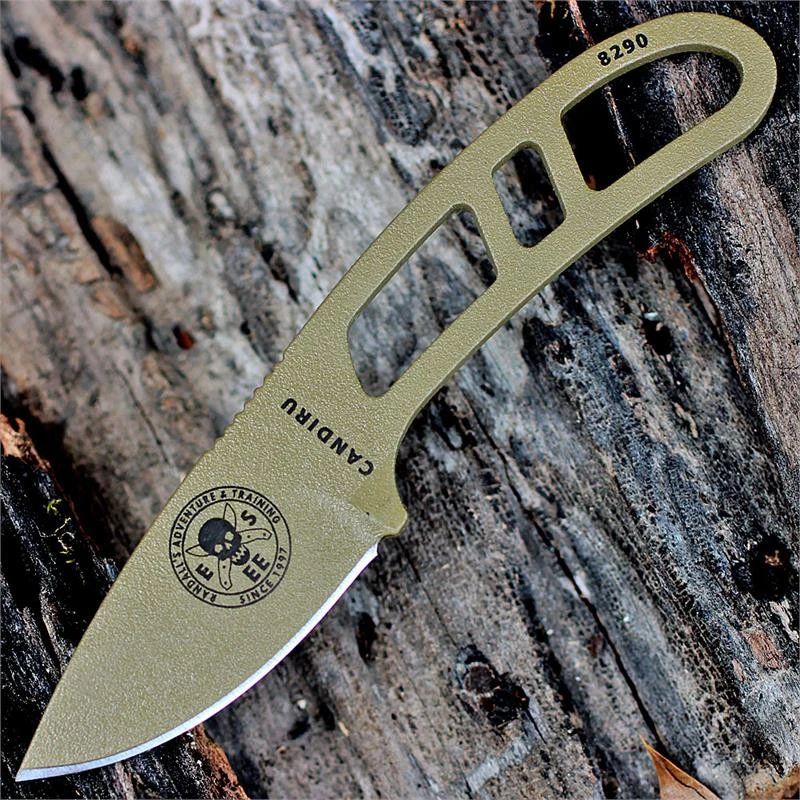 The ESEE Candiru Survival Kit (ESEE-CAN-DE-KIT) shown with its 2.00-inch 1095 plain edge drop point blade in a Dark Earth finish and flat grind, matching Dark Earth skeletonized steel handle, black polymer sheath, and the full kit: paracord, cord lock, split rings, ferro rod, whistle, and snap hook.