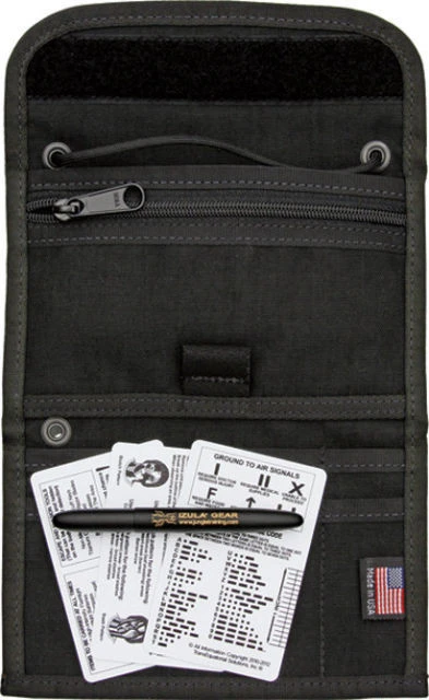 The ESEE Passport Case (PASSPORT-CASE-B) in black nylon, shown as a tri-fold case with multiple interior pockets, a zippered pocket with hidden money flap, a Velcro closure, and grommet holes for a paracord neck strap.