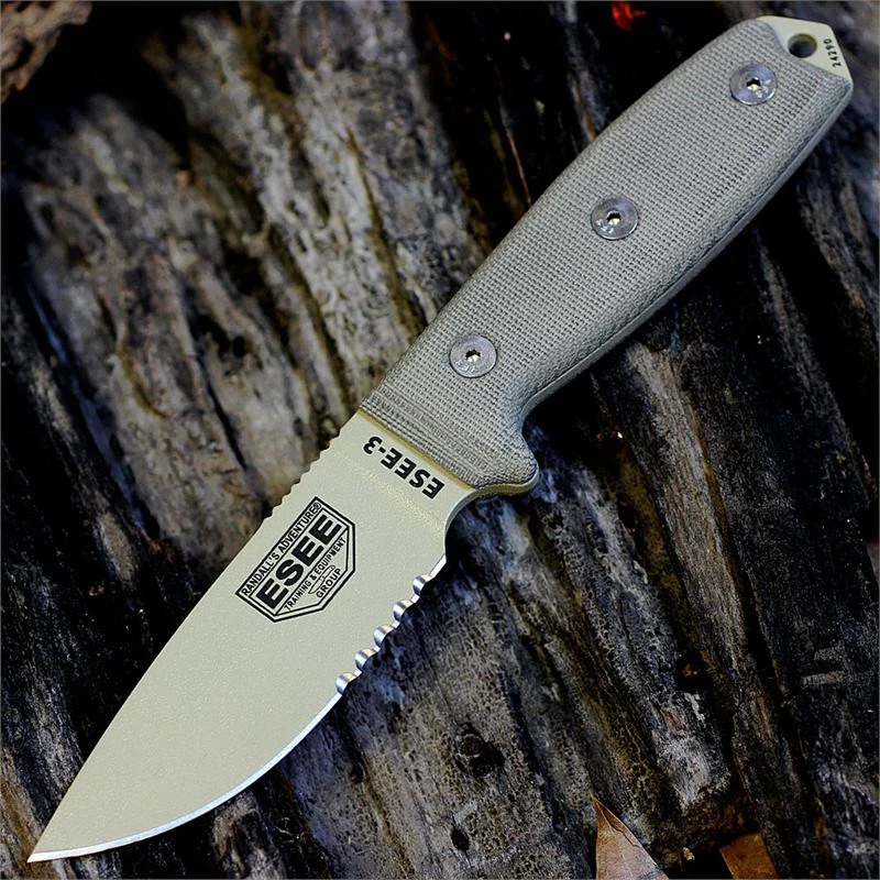 The ESEE-3 (ESEE-3S-MB-DT) shown with its 3.88-inch 1095 part serrated drop point blade in a Desert Tan finish and flat grind, tan Micarta handle scales, and its injection-molded OD Green plastic sheath with MOLLE back mounting.