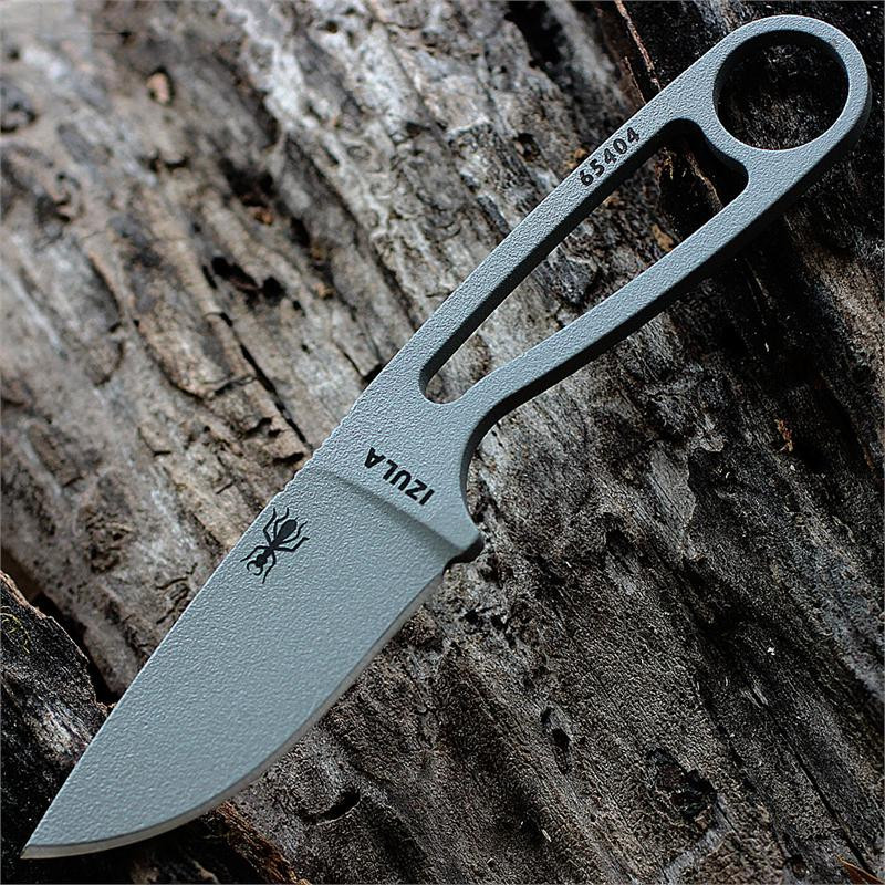 The ESEE Izula (IZULA-GRAY(SPC)) shown with its 2.63-inch 1095 plain edge drop point blade in a Gray finish and flat grind, Gray skeletonized steel handle, and its injection-molded black polymer sheath.