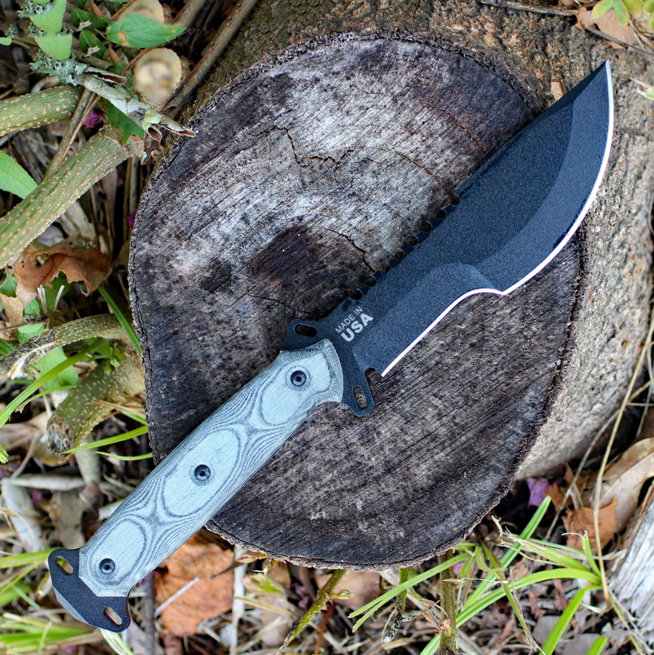 TOPS Skullcrushs Xtreme Sidekick (TPSXS01) 5.25" 1095 Black Traction Coated Clip Point Plain Blade w/ Sawback, Black Linen Micarta Handle, Black Kydex Belt Sheath