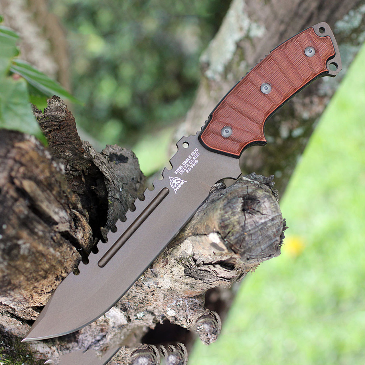 TOPS Steel Eagle Delta Class (TPSE107CDCRMT) 7.5" 1095 Bronze Clip Point Plain Blade w/ Sawback, Brown Micarta Handle, Tan Kydex Belt Sheath