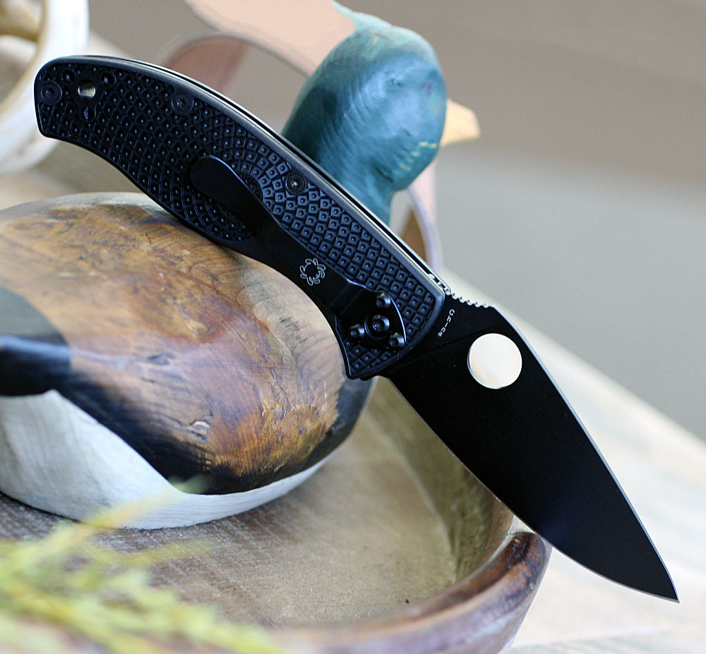 3.39 inch 8Cr13MoV black blade on a Spyderco Tenacious LW tactical folder.