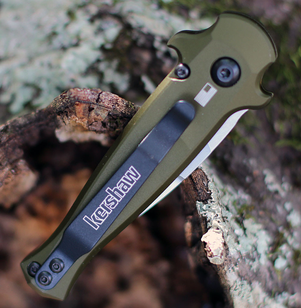 Kershaw 7130OLSW Launch 12 CA highlighting the OD green aluminum scales and carbon fiber inlays.
