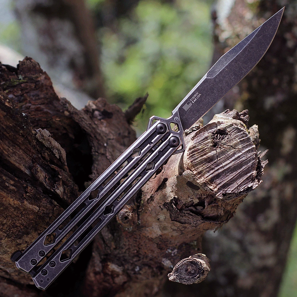 Close-up of the Kershaw Lucha KVT ball-bearing pivot and the rounded safety latch system.