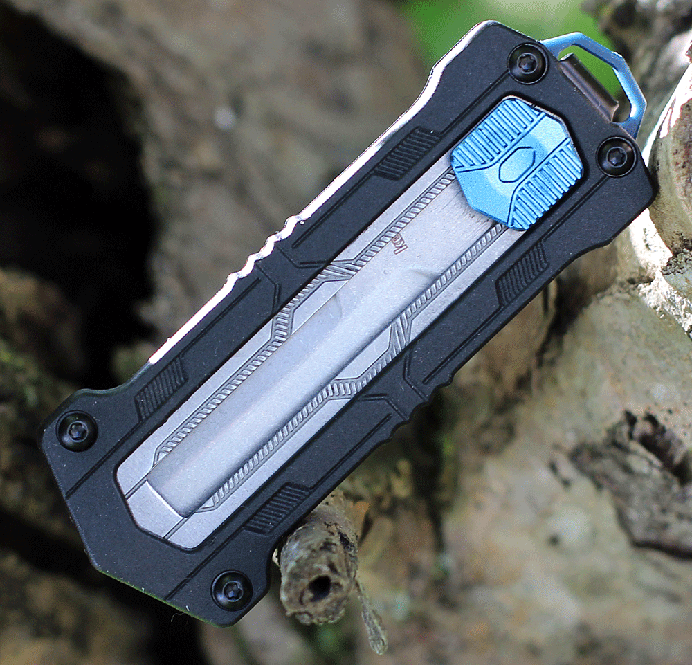 Kershaw 1190 Kapsule highlighting the machined GFN handle and blue PVD coated pivot.