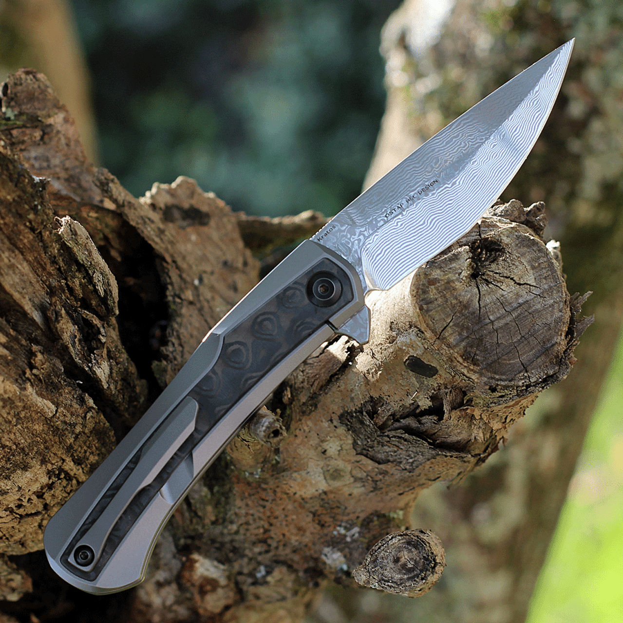 Kansept Knives Kratos (K1024A5) 3.79" Damascus Drop Point Plain Blade, Titanium Handle with Grey Marble Carbon Fiber Overlay